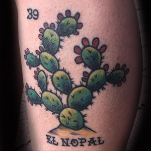 A full color traditional cactus tattoo